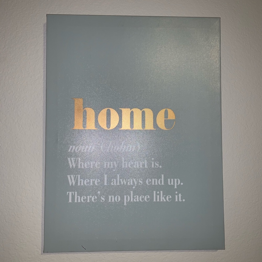 Small painting explaining what home is